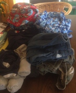 Gabriel's first attempt at folding laundry